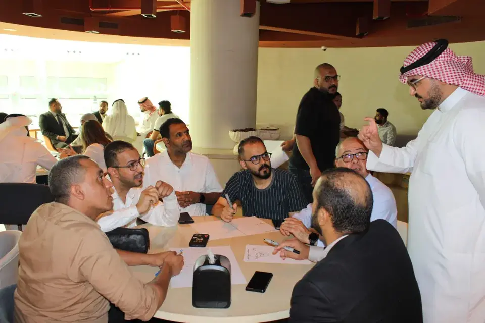 Participants collaborating at a Lumofy workshop